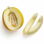 sliced yellow fruit on white background